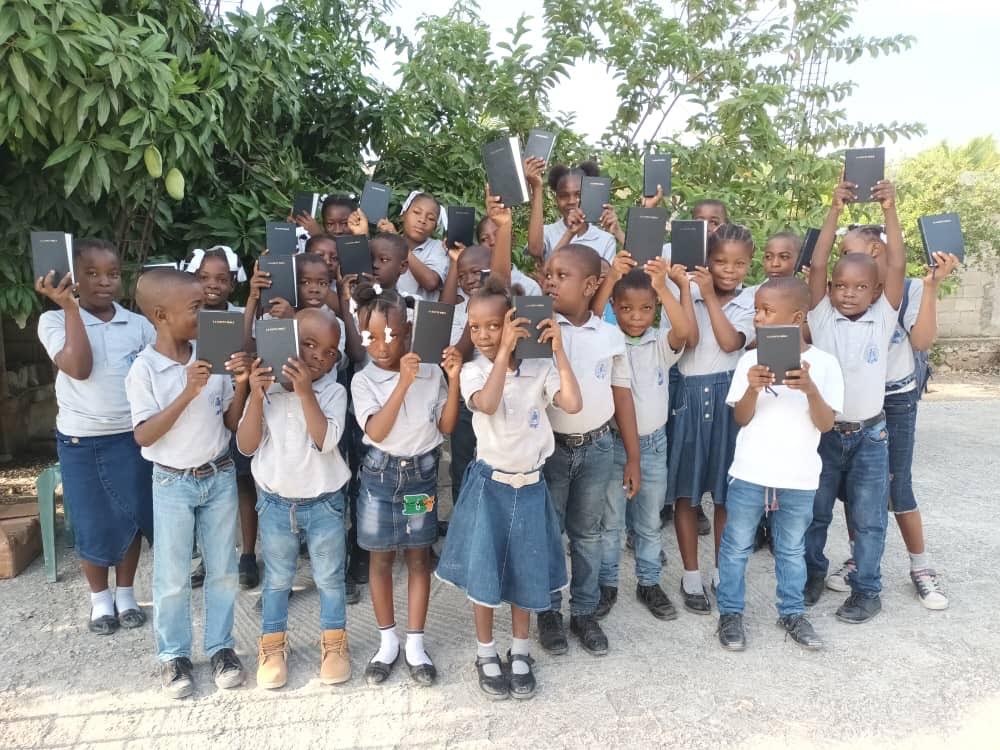 A group of students gathered outdoors